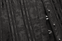 Close-up of black brocade fabric and vertical boning channels on underbust corset