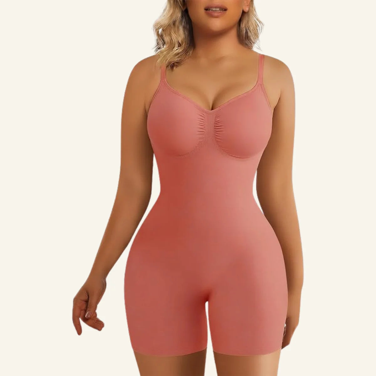 Seamless adjustable straps tummy control shorts bodysuit front view in Coral Pink