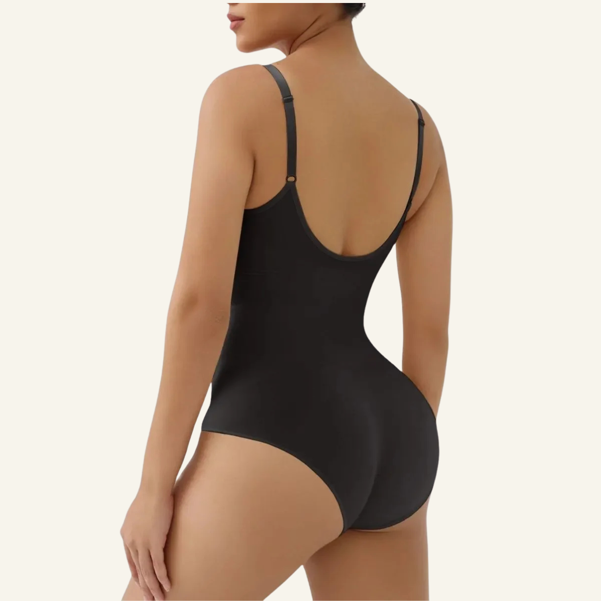 Back view of a black SHAPERX brief bodysuit showing the rear coverage